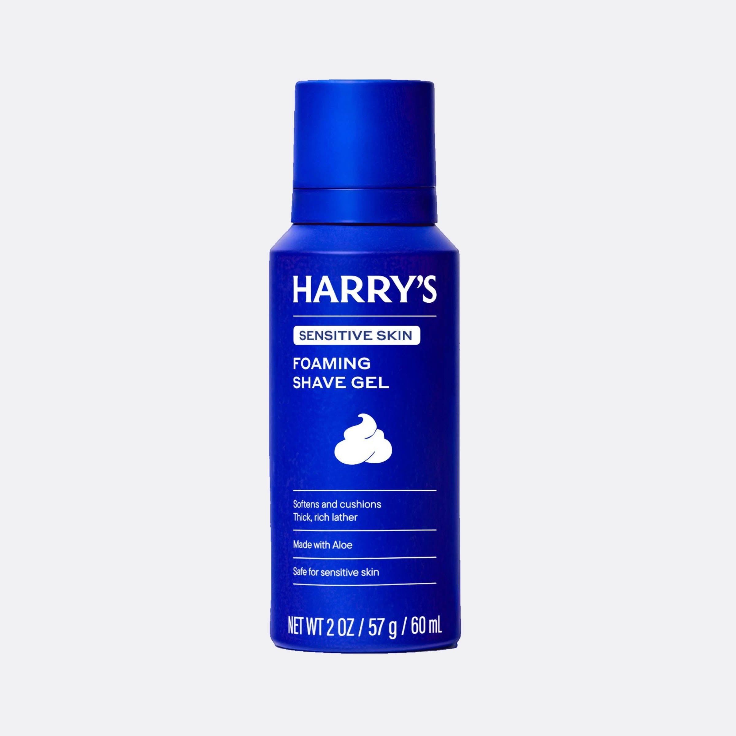 Blue bottle of Harry's sensitive skin foaming shave gel on a light gray background
