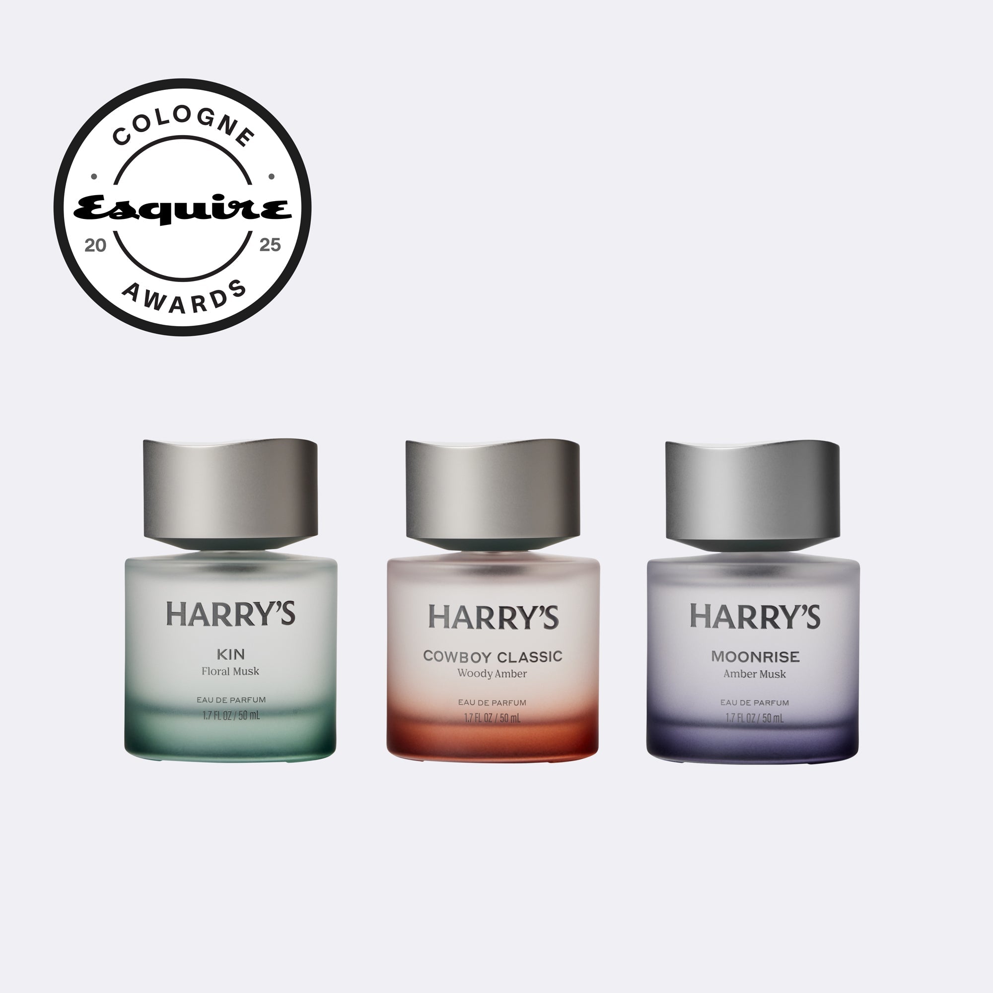 Three Harry's cologne bottles with 'Esquire' award logo on a white background